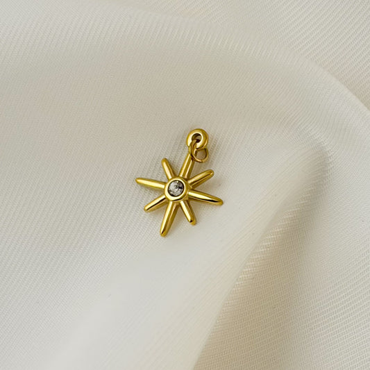 Dije estrella con zirconia acero inoxidable dorado