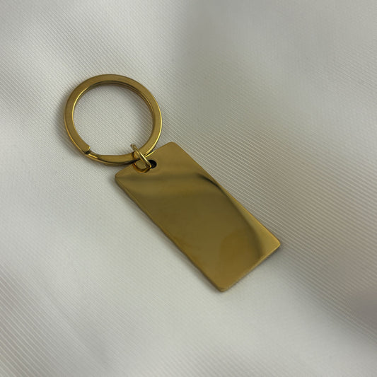 Llavero rectagular acero inoxidable dorado