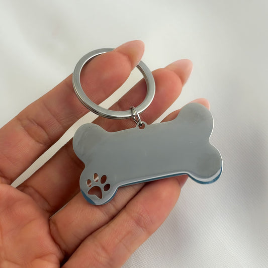 Llavero plaquita hueso acero inoxidable patita de perro
