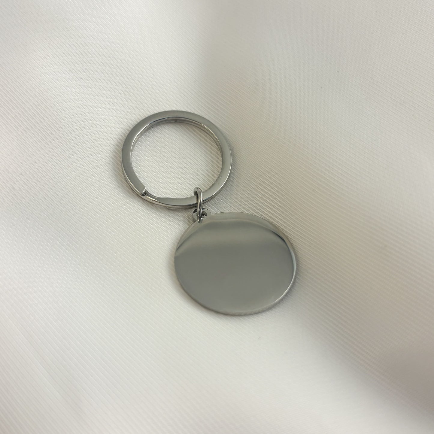 Llavero circular 2.5 cm acero inoxidable para grabar