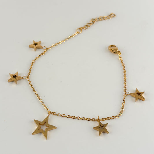 Pulsera acero inoxidable dorada dije contorno estrellas gruesas 20 cm