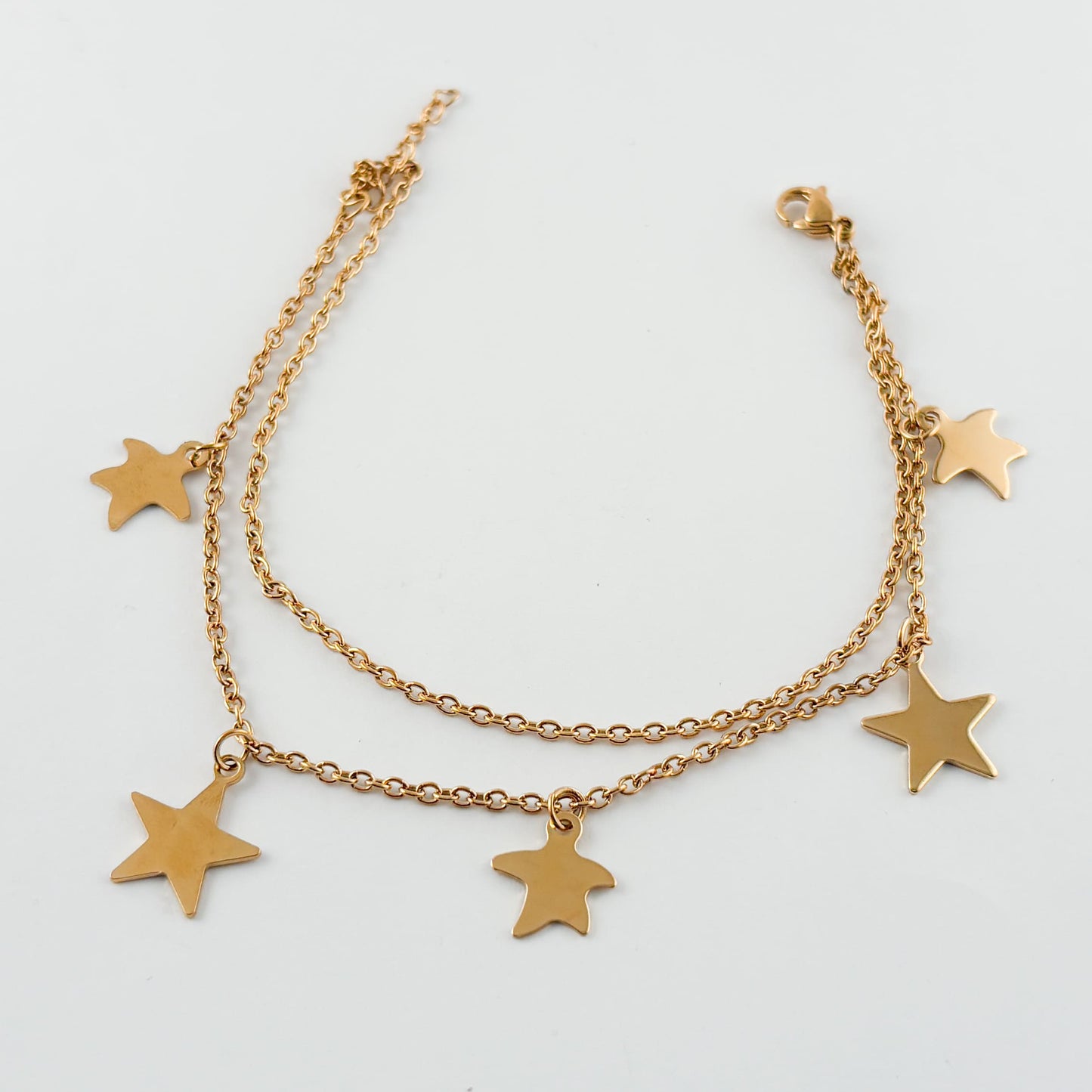 Pulsera acero inoxidable dorada doble cadena estrellas lisas