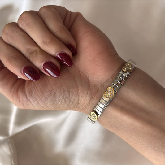 Pulsera acero inoxidable extensible corazones dorados