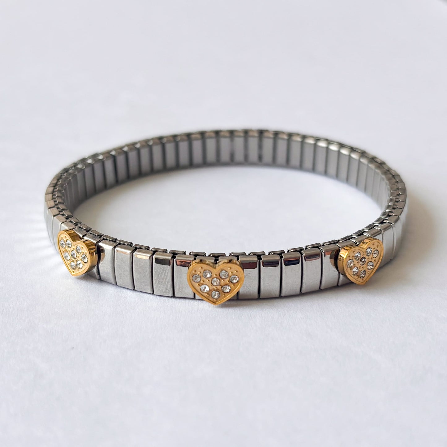 Pulsera acero inoxidable extensible corazones dorados