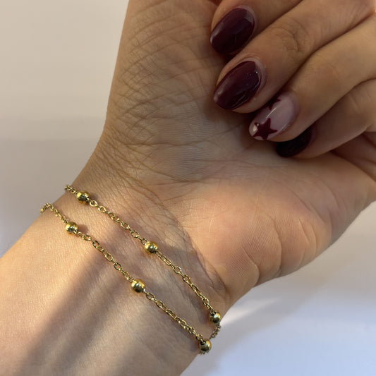 Pulsera doble cadena bolitas acero inoxidable dorado