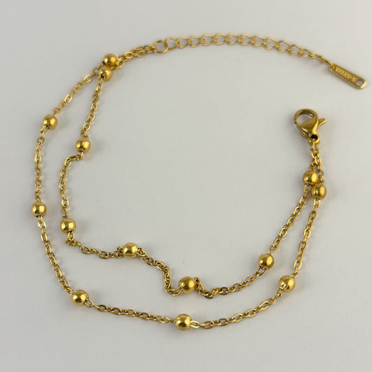 Pulsera doble cadena bolitas acero inoxidable dorado