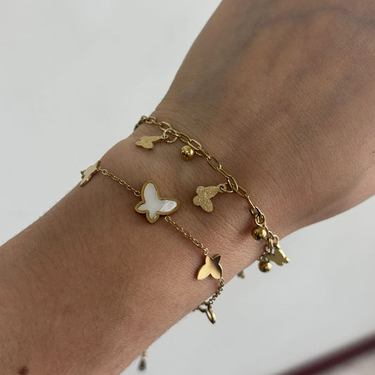 Pulsera acero inoxidable mariposas madre perla dorado