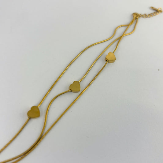 Pulsera acero inoxidable triple corazones dorados