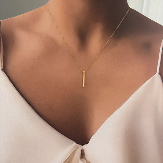 Set acero inoxidable collar y aretes barra en dorado