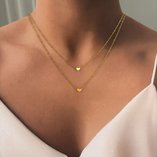 Set acero inoxidable aretes y collar doble corazón mini dorado