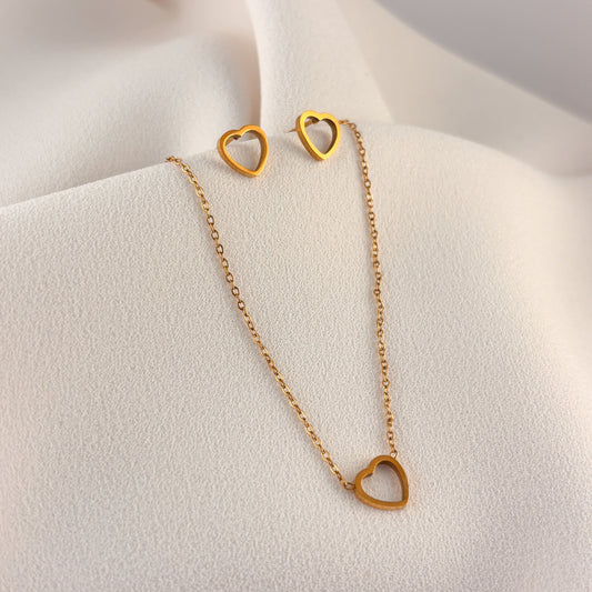 Set aretes y collar acero inoxidable corazón contorno dorado