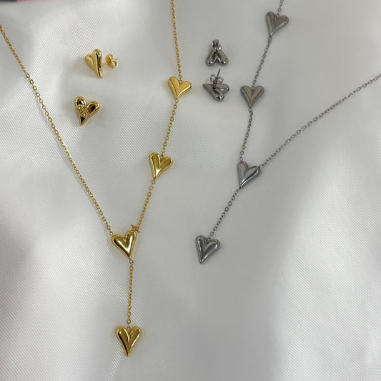 Set collar con aretes acero inoxidable corazones alargados