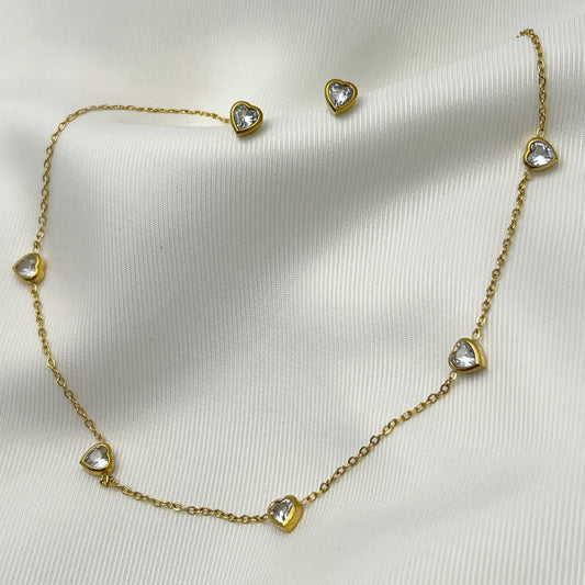 Set aretes y collar acero inoxidable corazón zirconias dorado