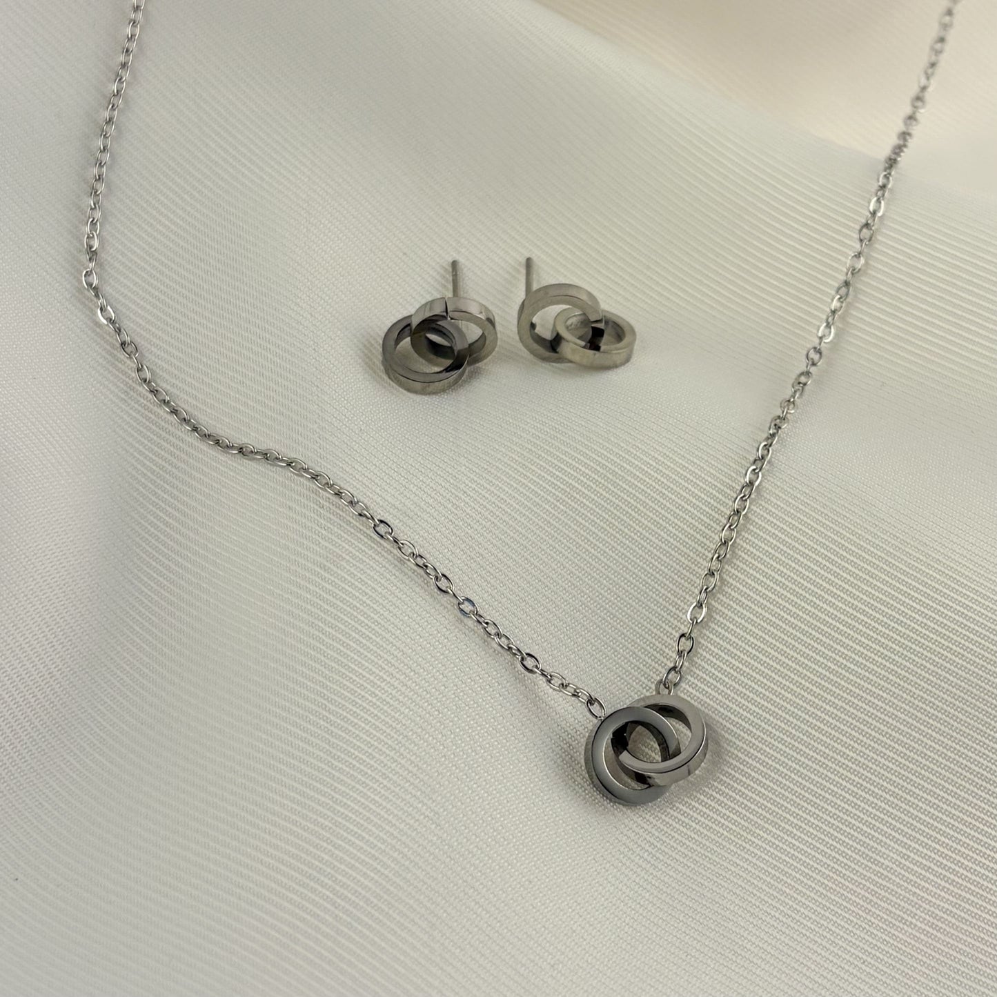 Set collar aretes acero inoxidable aros entrelazados