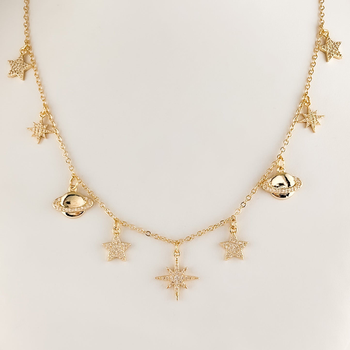 Collar multi dijes chapa de oro zirconias estrellas y planetas