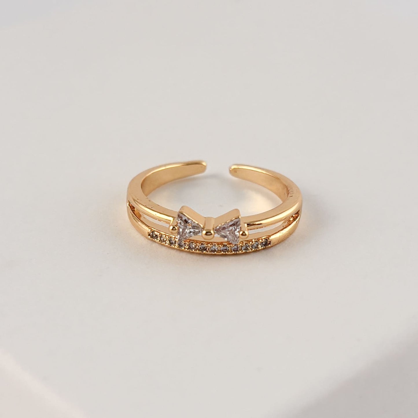 Anillo doble ajustable chapa de oro zirconias moño