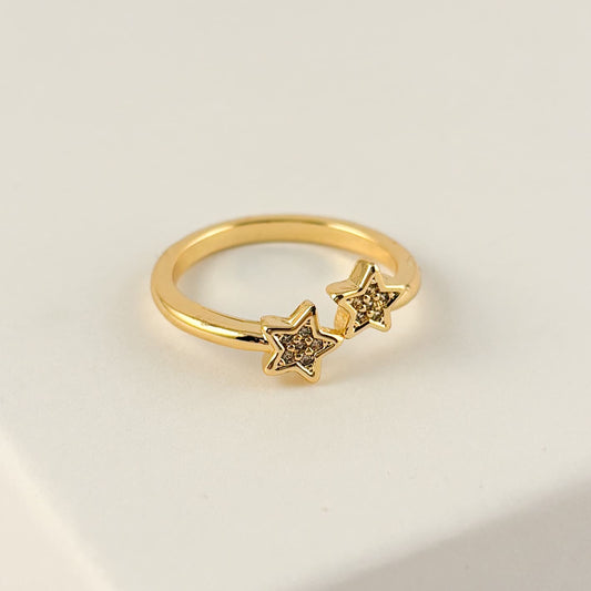 Anillo ajustable chapa de oro dos estrellas zirconias