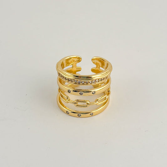 Anillo grueso 5 anillos zirconias chapa de oro