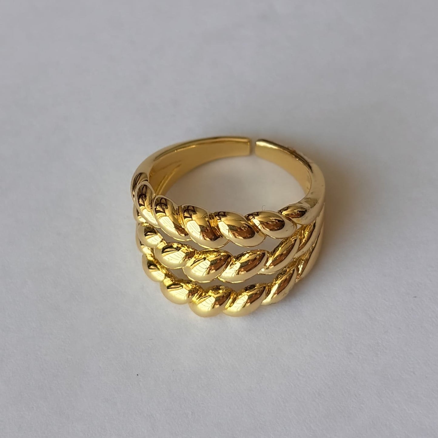 Anillo triple trenzado chapa de oro ajustable