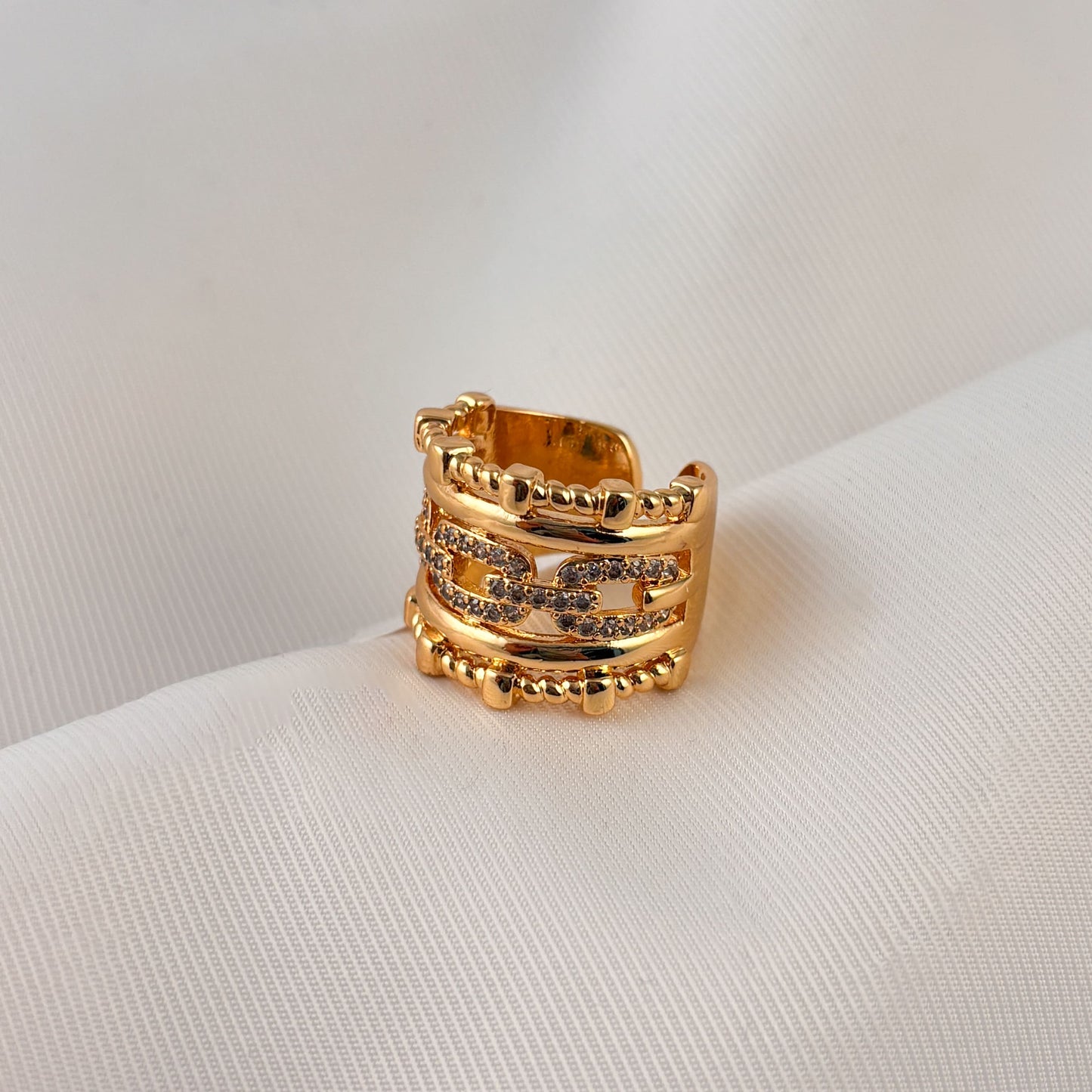 Anillo grueso eslabón y zirconias chapa de oro