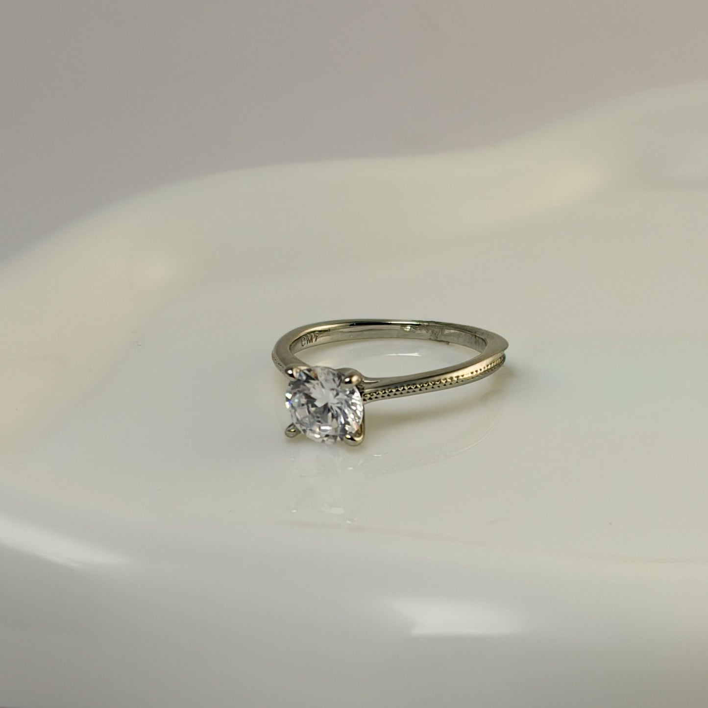 Anillo solitario baño de rodio tallas