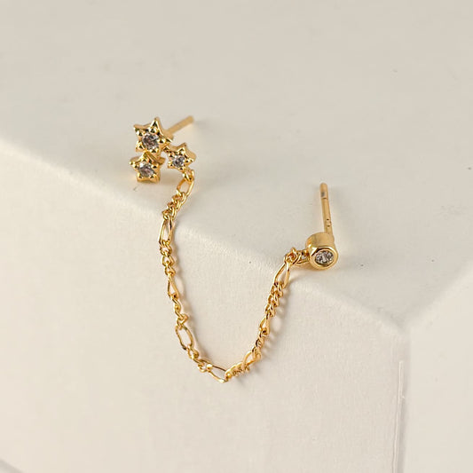 Arete piercing cadena para dos perforaciones chapa de oro