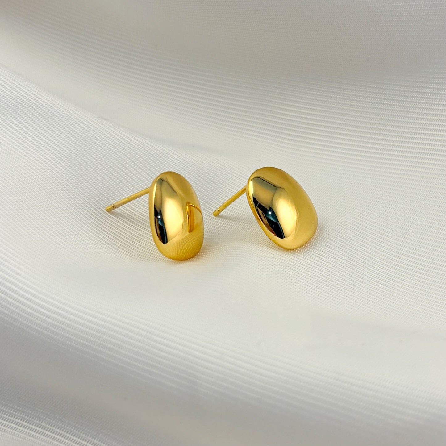 Aretes pegados luneta chapa de oro