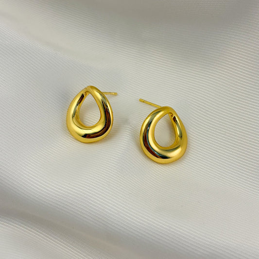 Aretes chapa de oro pegados aro irregular