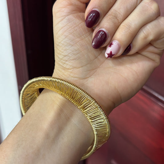 Brazalete grueso tejido chapa de oro