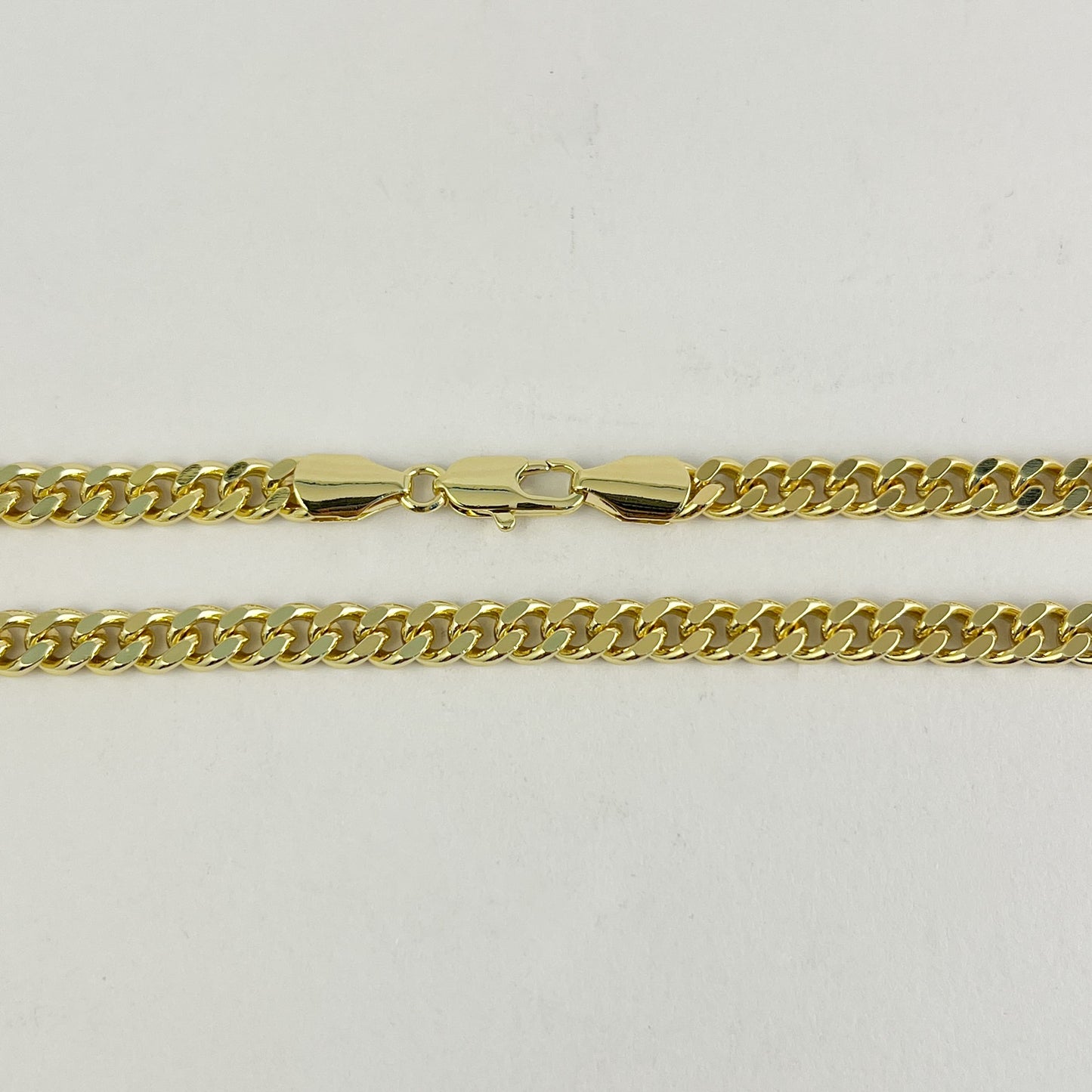 Cadena barbada 5 mm chapa de oro 55 cm