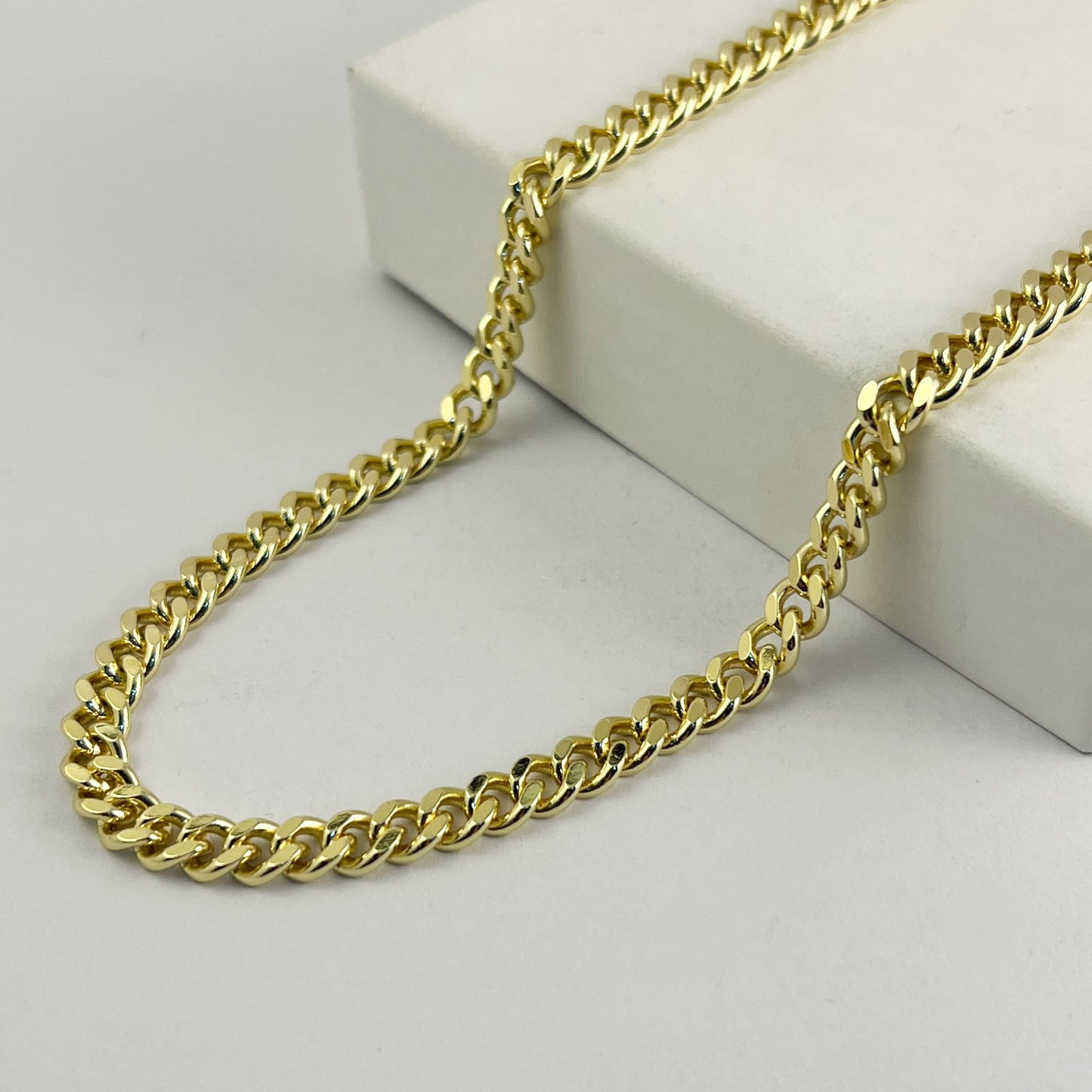 Cadena barbada 5 mm chapa de oro 55 cm