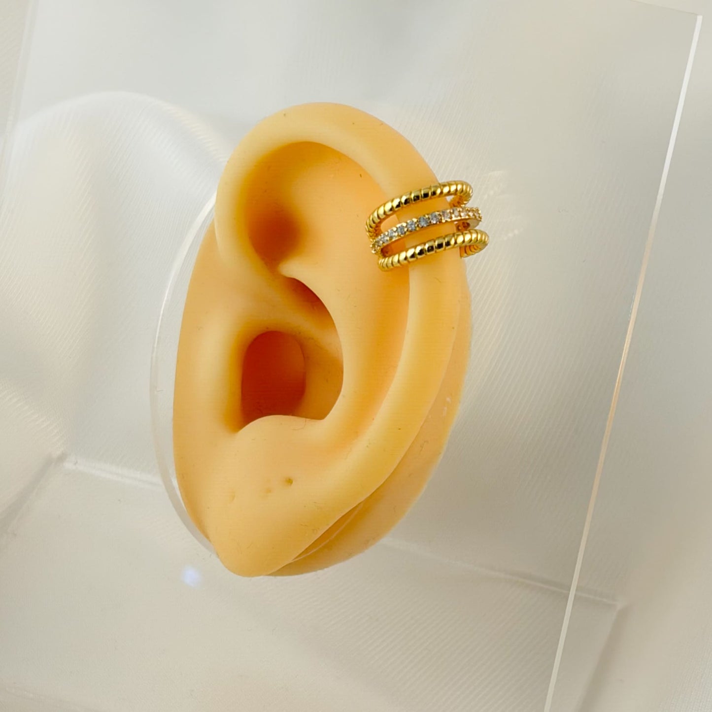 Ear cuff triple una fila de zirconias chapa de oro