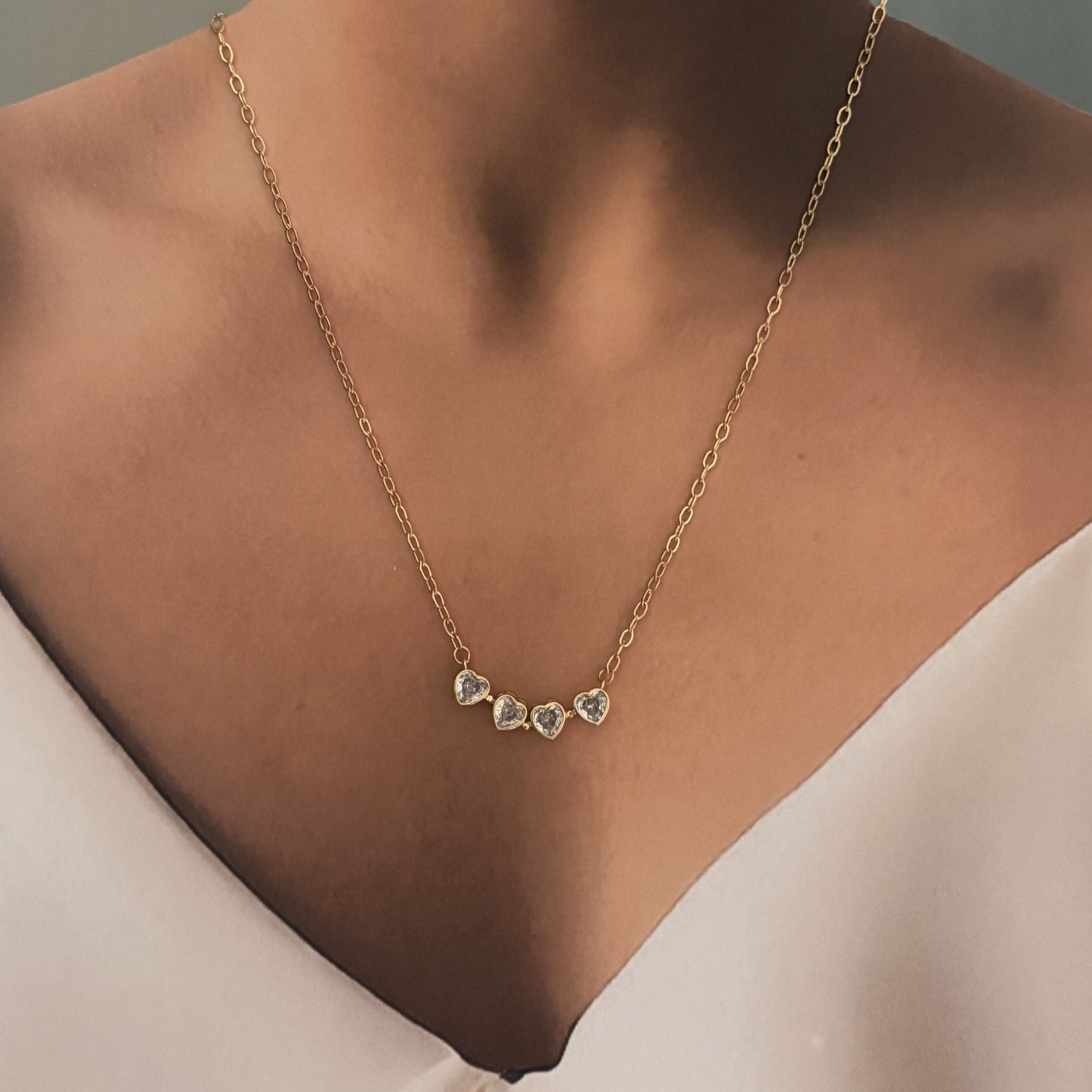 Collar trébol imanes doble vista chapa de oro