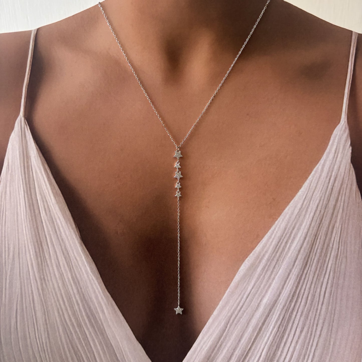 Collar chapa de oro corbatín estrellas