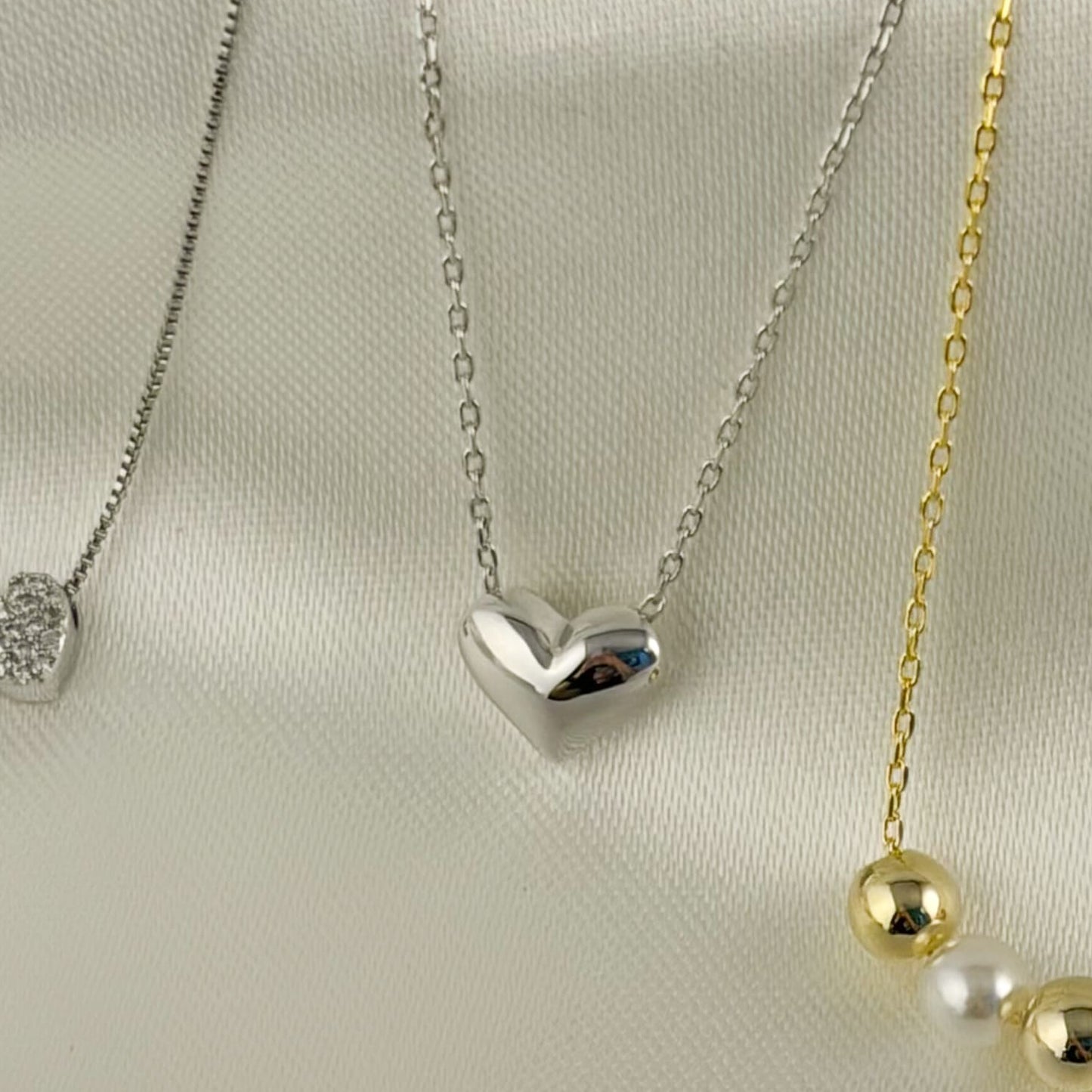 Collar dije corazón mini globo baño de oro plateado