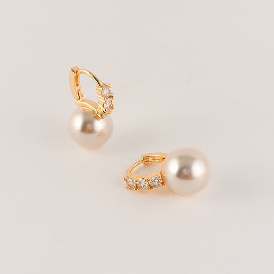 Huggies perla 3 zirconias chapa de oro