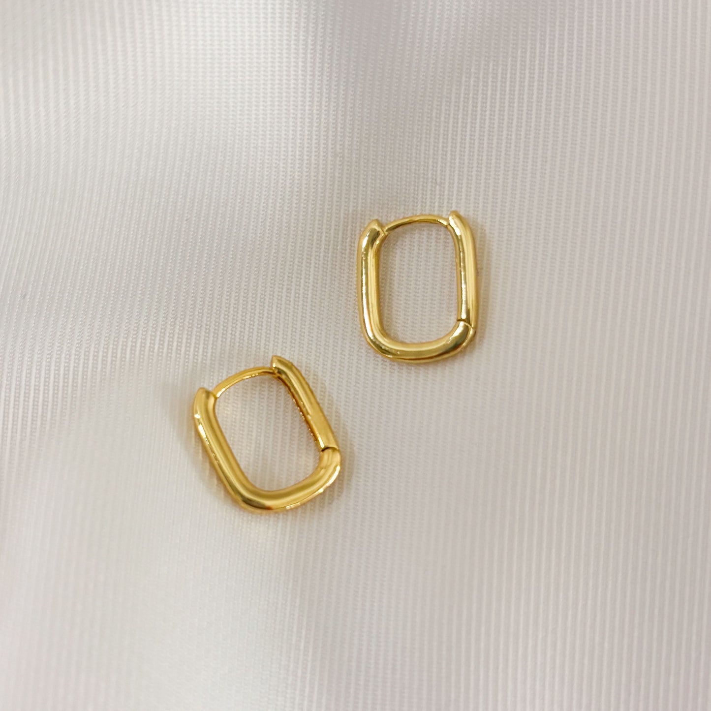 Huggies rectangulares chapa de oro