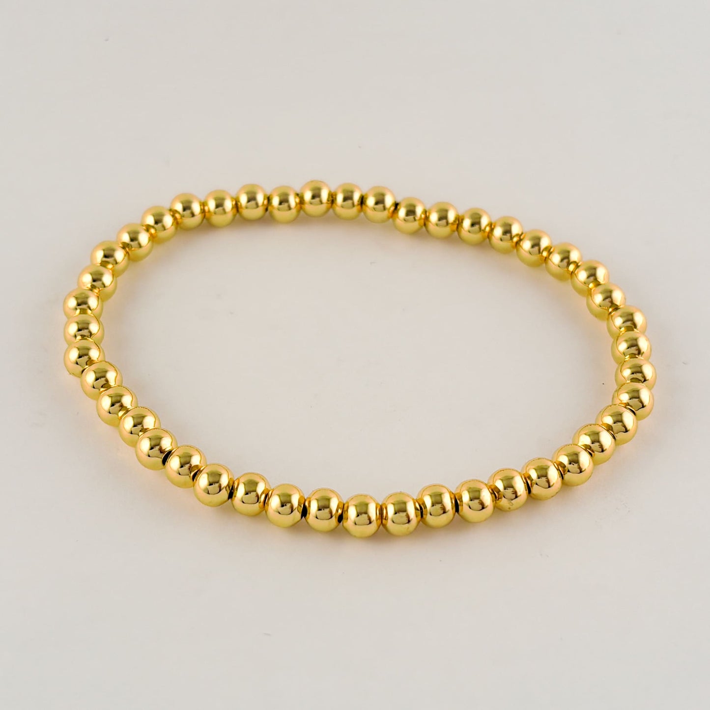 Pulsera esferitas chapa de oro elástico 4 mm ¡Elige el color!