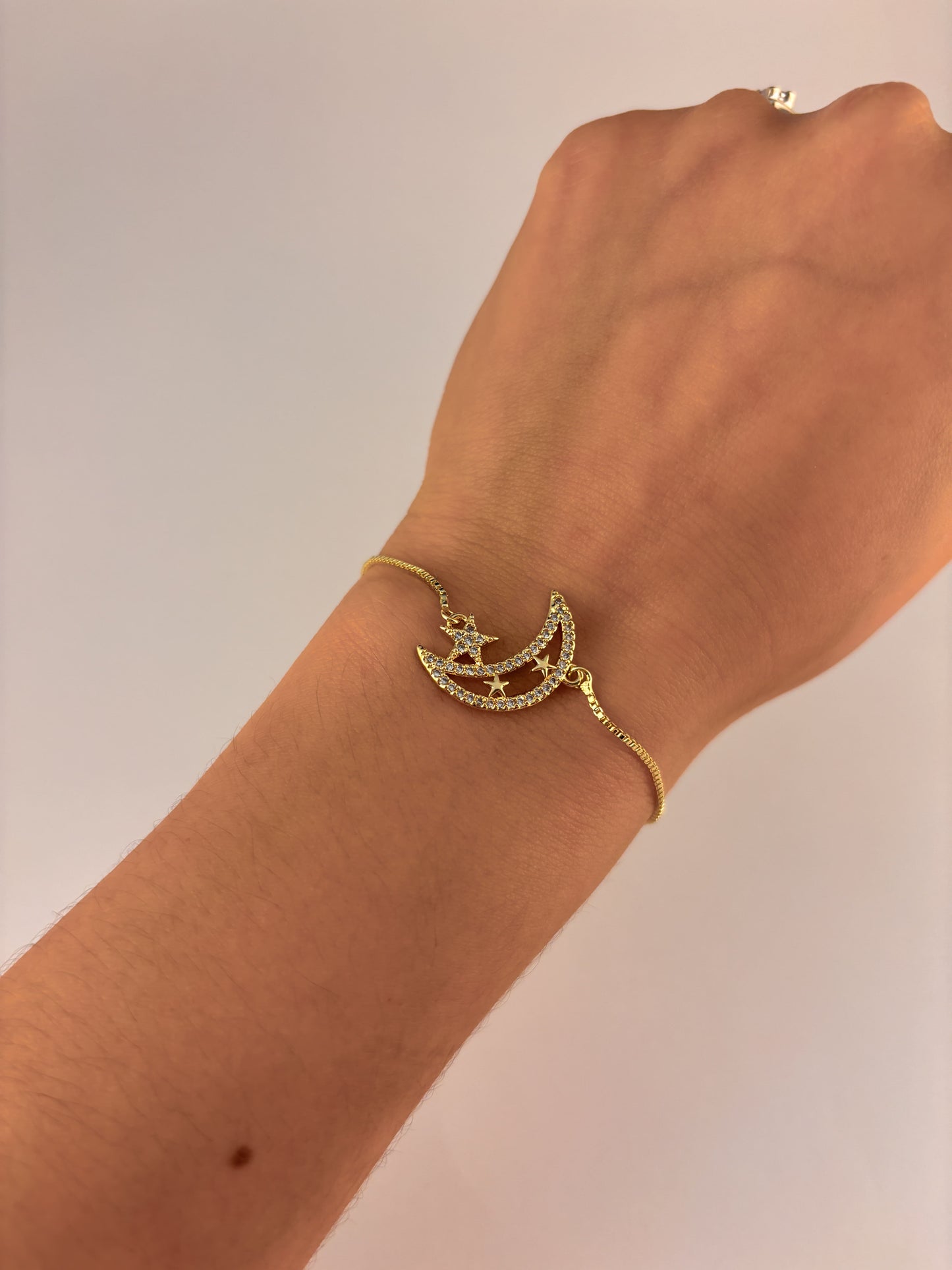 Pulsera ajustable luna y estrellas zirconias chapa de oro