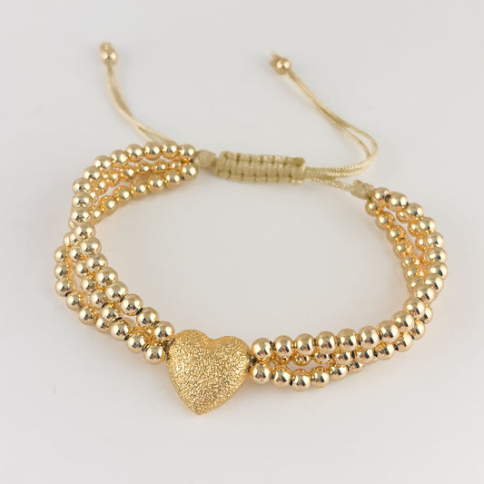 Pulsera bolitas corazón triple hilo ajustable chapa de oro