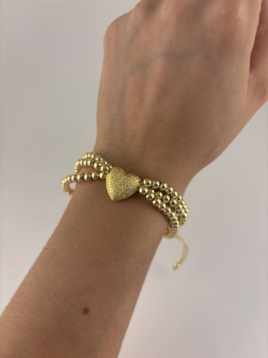 Pulsera bolitas corazón triple hilo ajustable chapa de oro