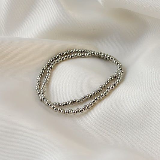 Set de 2 pulseras bolita mini chapa de oro elástico