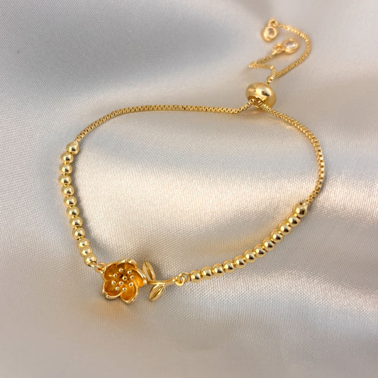 Pulsera ajustable chapa de oro flor bolitas