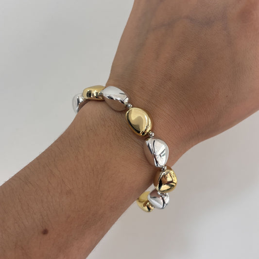 Pulsera piedra bicolor plastimetal elástico chapa de oro