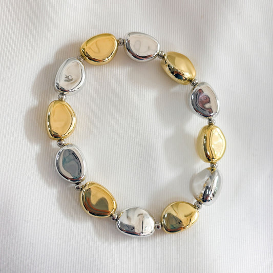 Pulsera piedra bicolor plastimetal elástico chapa de oro