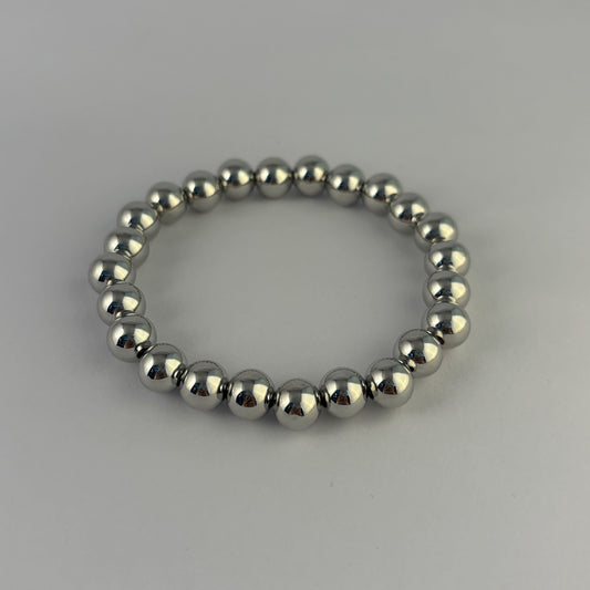 Pulsera bolas plateadas chapa de oro elástico
