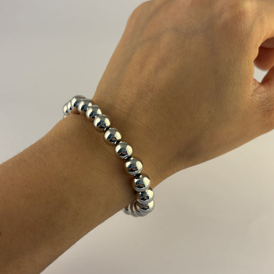 Pulsera bolas plateadas chapa de oro elástico
