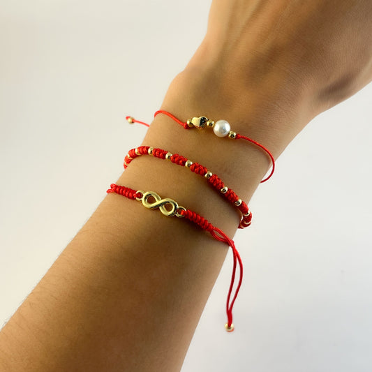 Pulsera hilo rojo bolitas chapa de oro