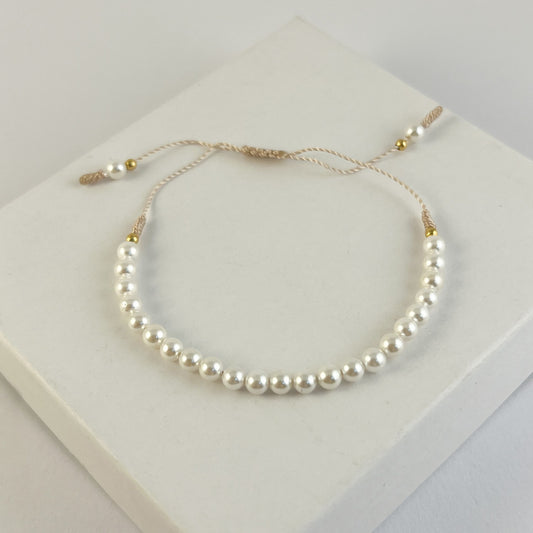 Pulsera hilo perlitas chapa de oro
