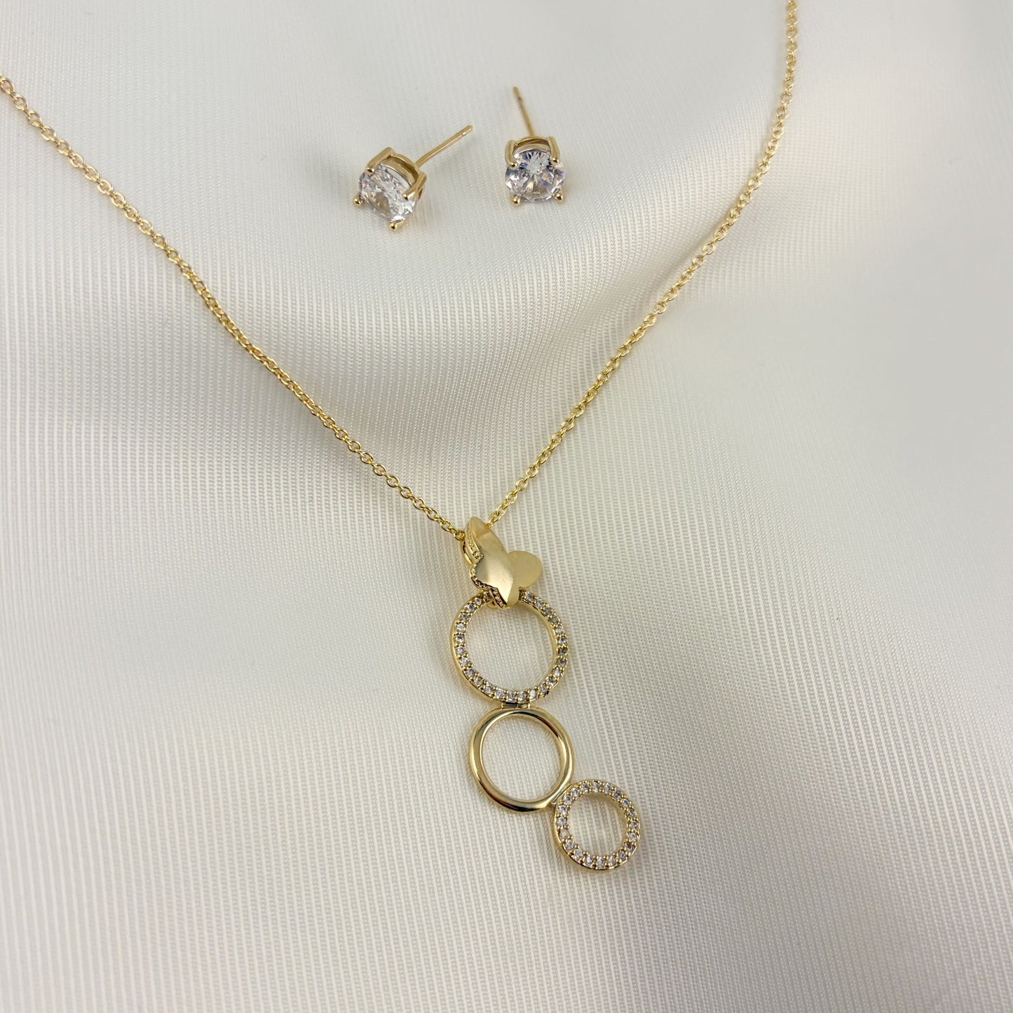 Set aretes y collar aros mariposa zirconia chapa de oro